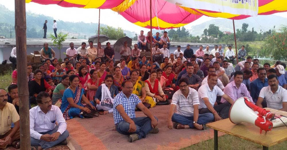 State teacher stuck to Strike