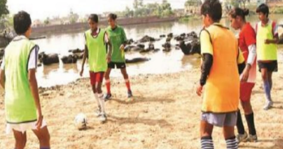 alakhpura village of bhiwani, where girls are football champions and practice with buffalows