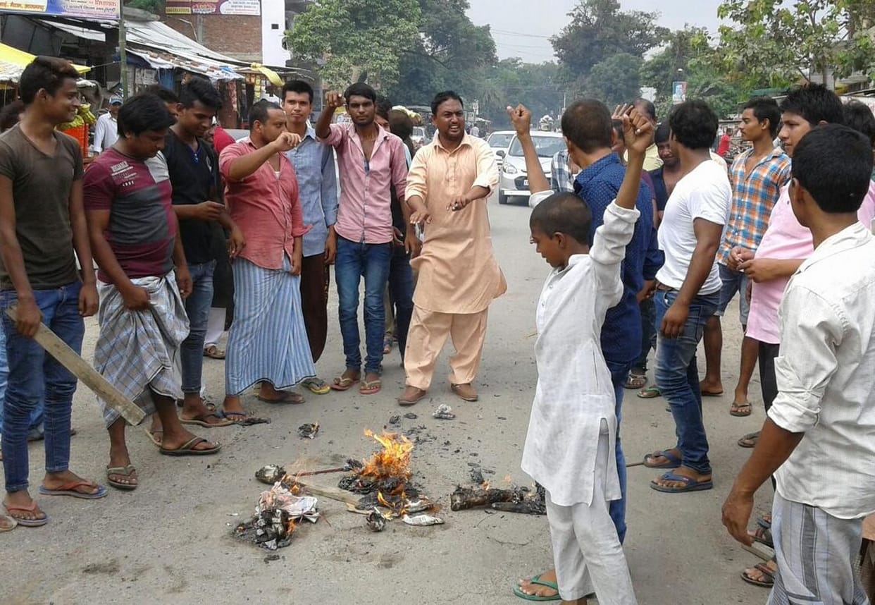  Burned effigies in protest cuts
