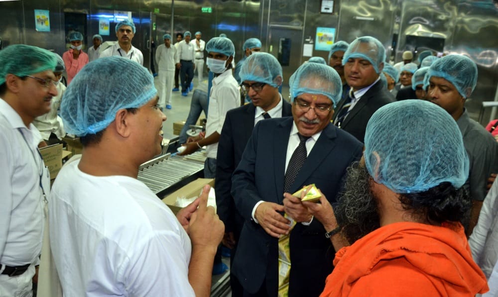 nepal pm praises baba ramdev patanjali products