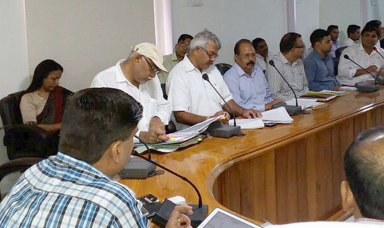 absent from the meeting are officials pay cut.
