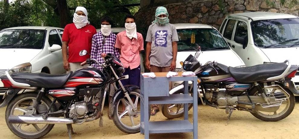 Arrested for stealing vehicles, vehicles with weapons seized