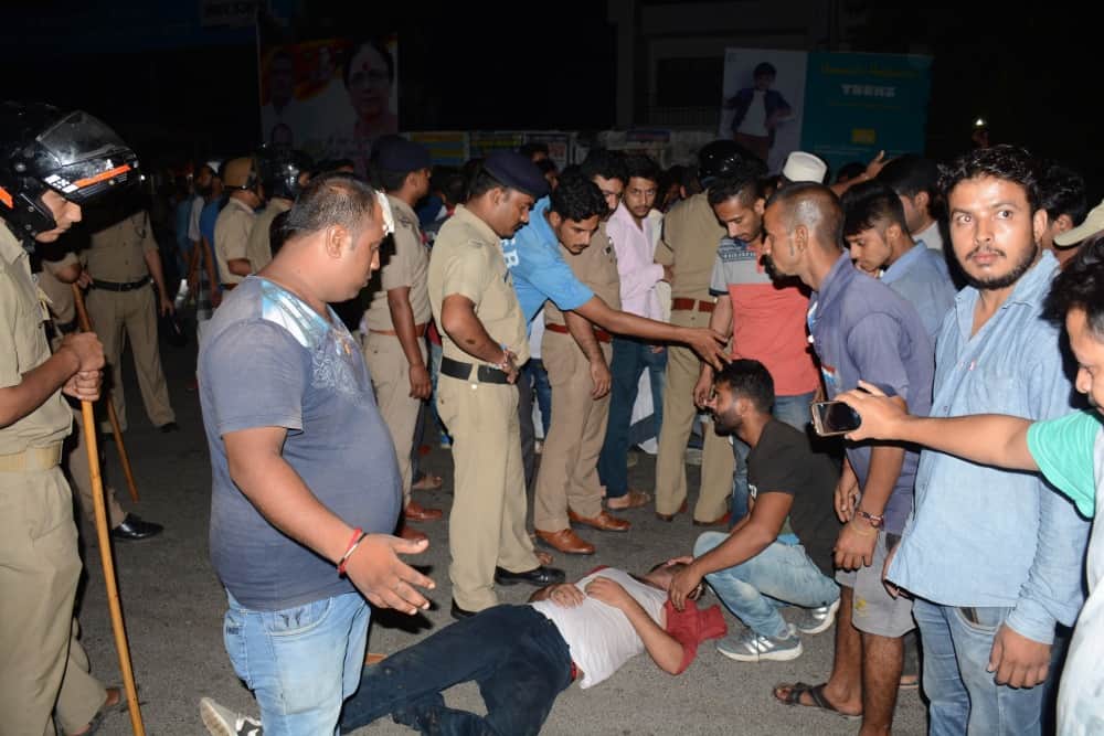 police beating innocent people, publice got angry