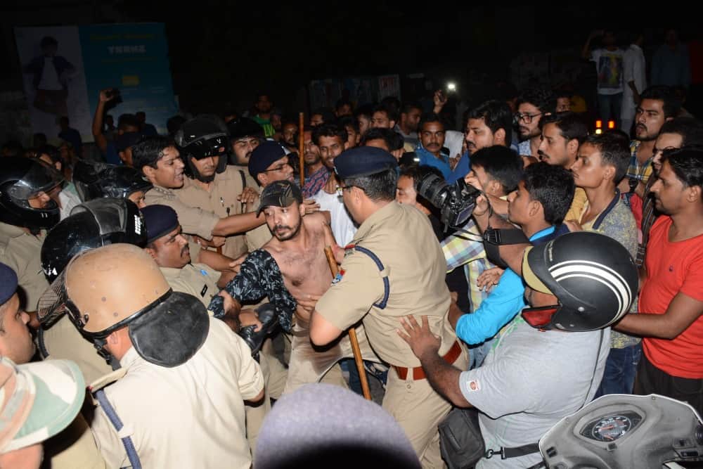 police beating innocent people, publice got angry