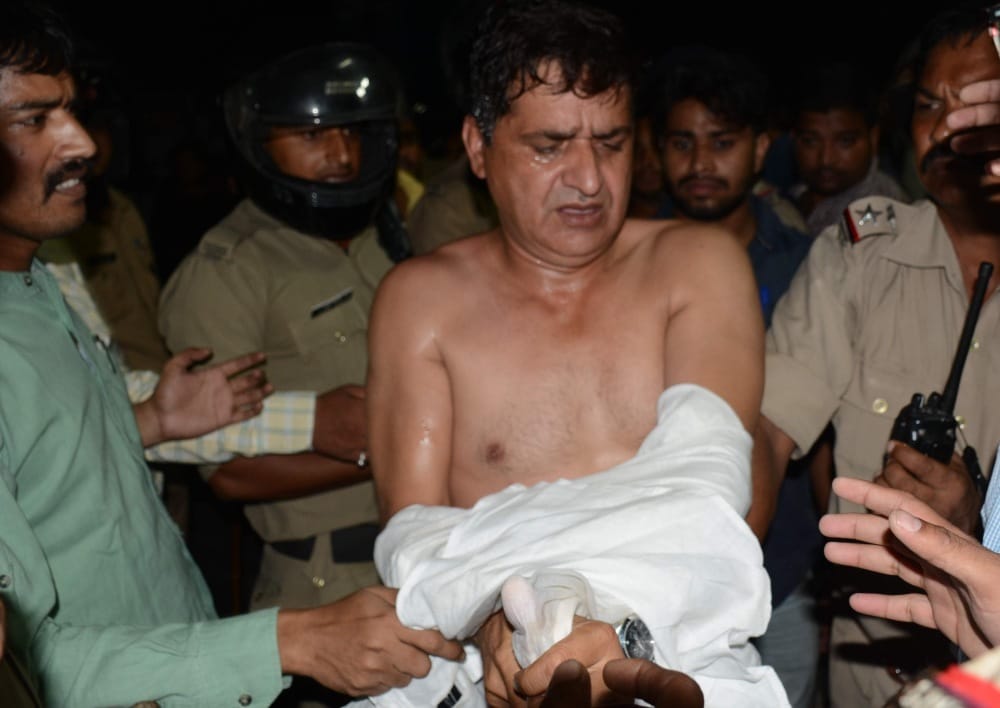 police beating innocent people, publice got angry