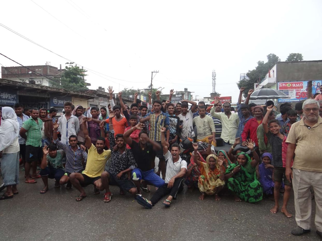 angry villagers blocked the road