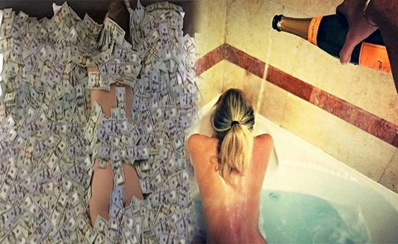The Rich Kids lie on beds covered in money 