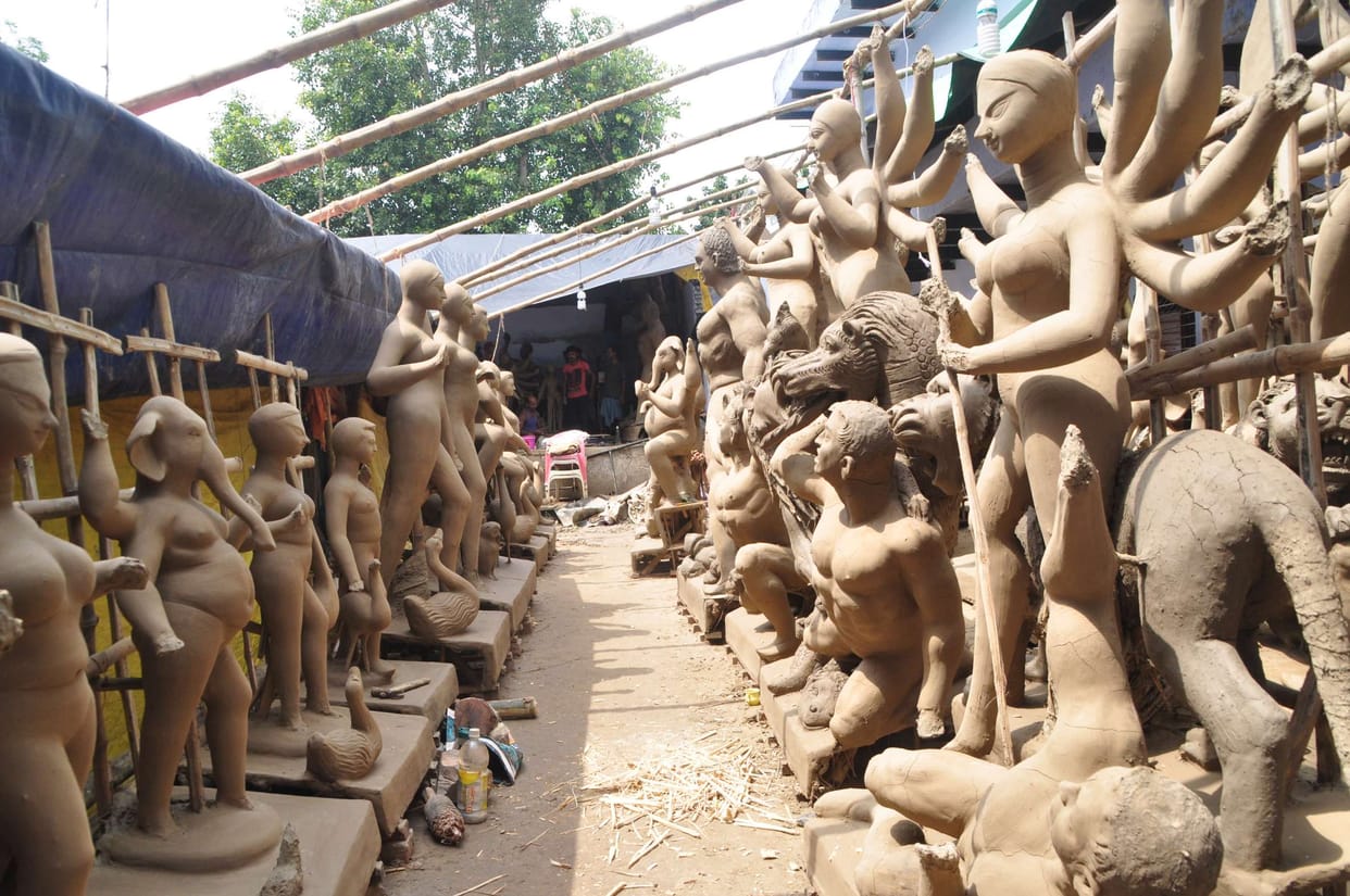 Mother working at sculptures
