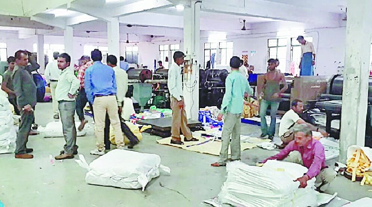 Income Tax raids at two factories