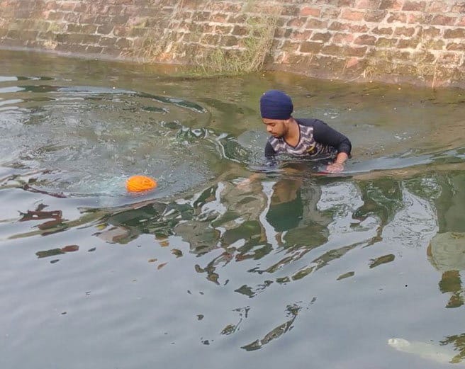 holy book guru granth sahib discourtesy in jalandhar, pages found in canal