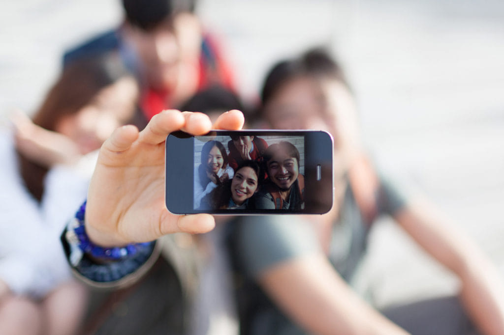 women beaten by group opposing selfie in noida 