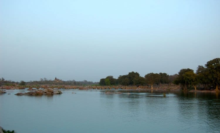three children immersed in ken river  