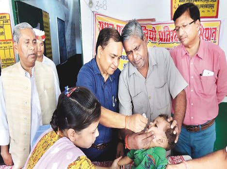 Children drink two drops of life