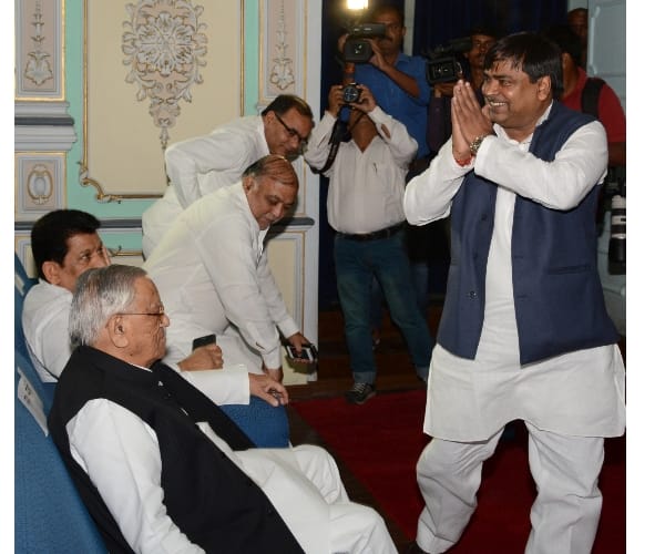 gayatri prasad prajapati takes oath as cabinet minister.