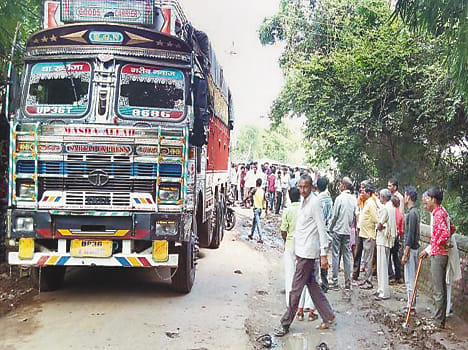 woman trampled by truck