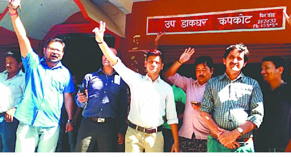 Traders work at the post office fierce from collapse