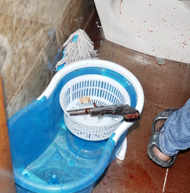 Builder shot dead himself in the bathroom