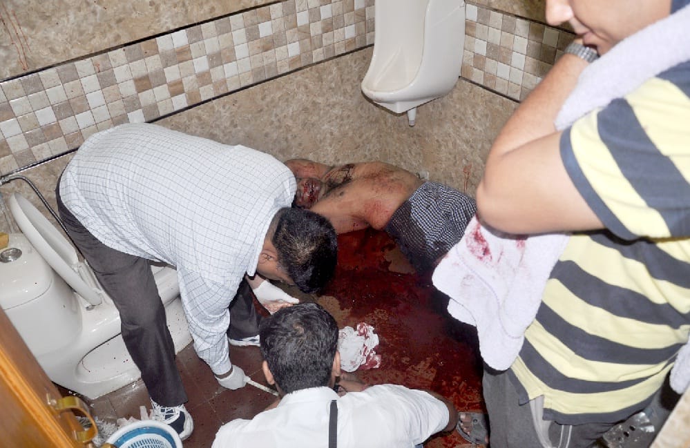 Builder shot dead himself in the bathroom