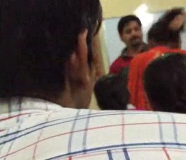 zalim teacher of karnal, beaten 12th class girl students with by catching with hairs