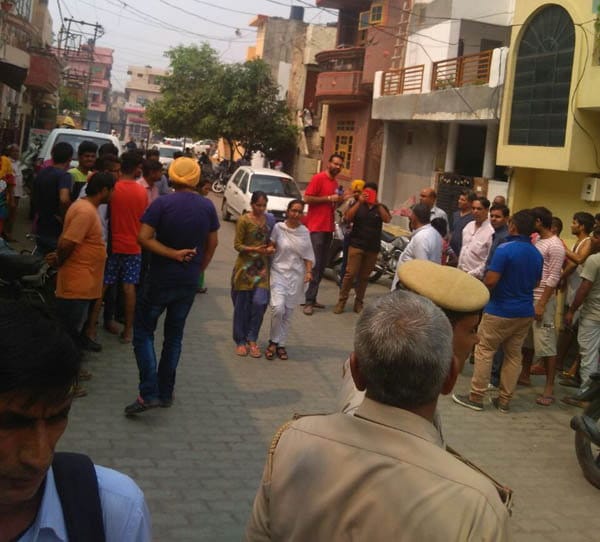 karnal man killed wife and committed hanging suicide due to adopted son