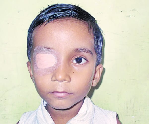 principal beats student with stick in gonda