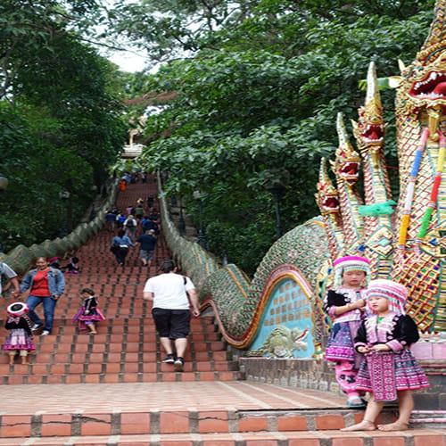 Two tiny Thai thieves steal from a female tourist