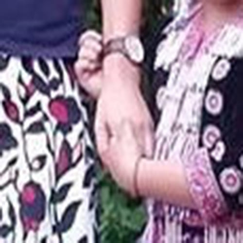 Two tiny Thai thieves steal from a female tourist