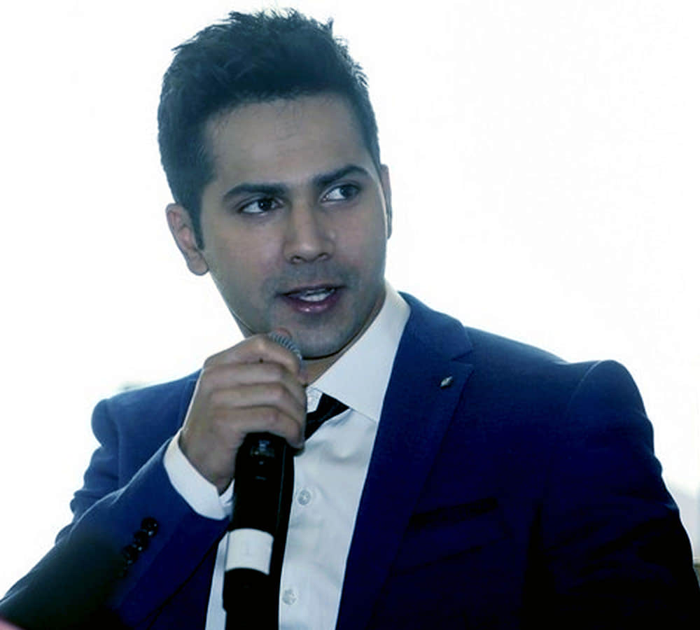 bollywood actor varun dhawan filed fir against his female fan