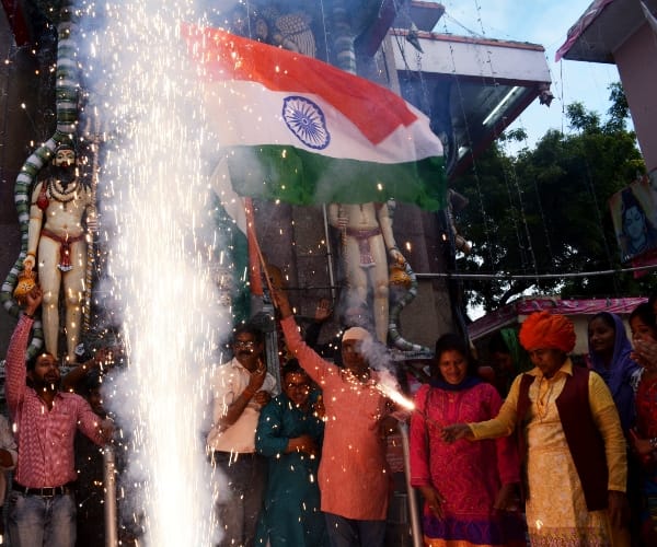  People celebrate the bravery of Indian army in Lucknow.