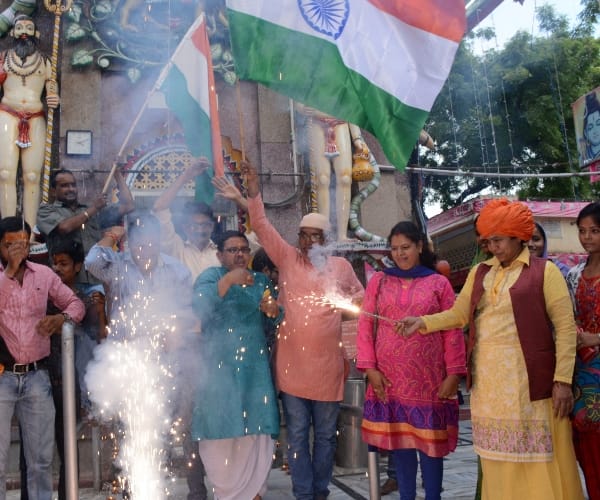  People celebrate the bravery of Indian army in Lucknow.