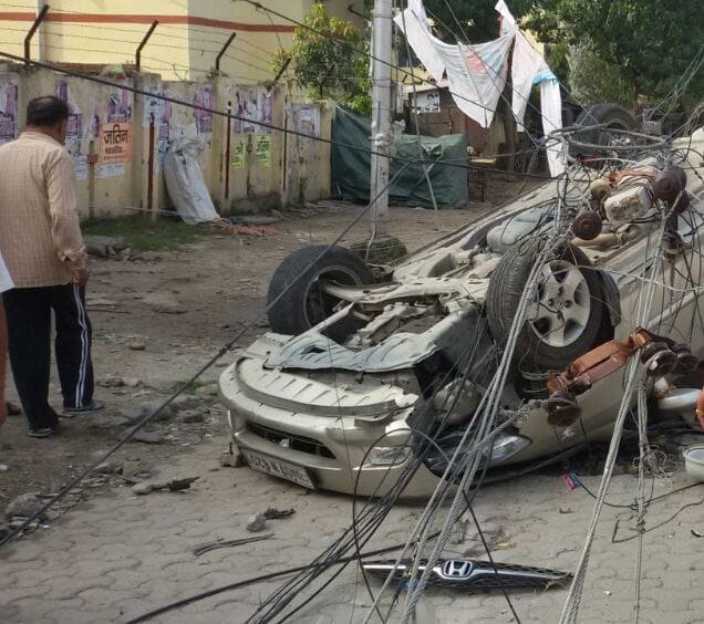 honda city car upturned due to electrical wire