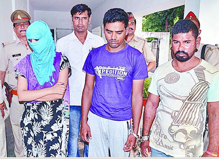 Three, including a woman arrested in robbery