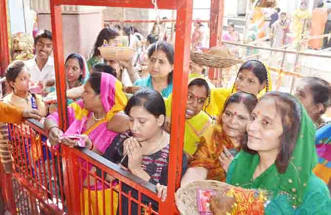  urn with installation devotees celebrate Mother Goddess