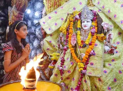  urn with installation devotees celebrate Mother Goddess