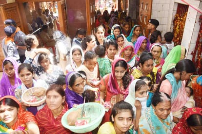  urn with installation devotees celebrate Mother Goddess