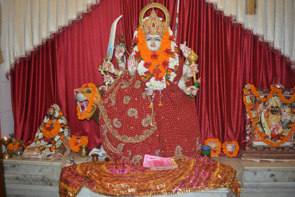 Devotees worship descended to