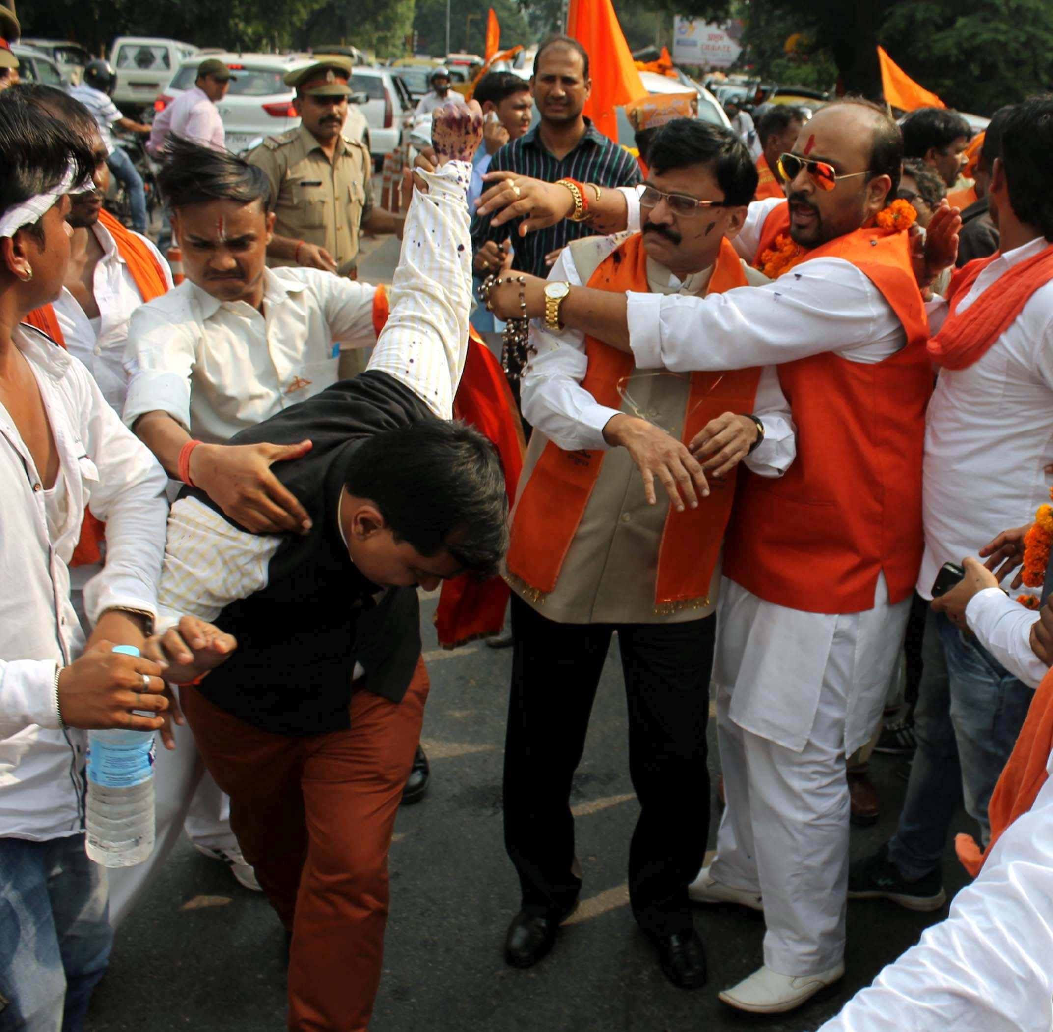 party workers brutally beaten after throwing in on sanjay raut