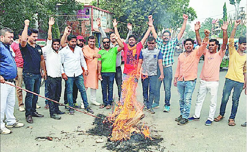 Arvind Kejriwal burnt effigies of