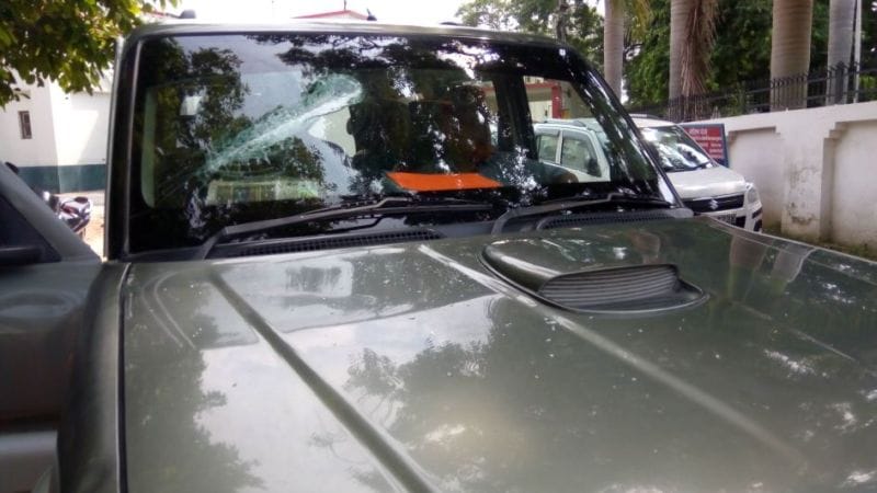 During the checking of broken car glass of bank manager