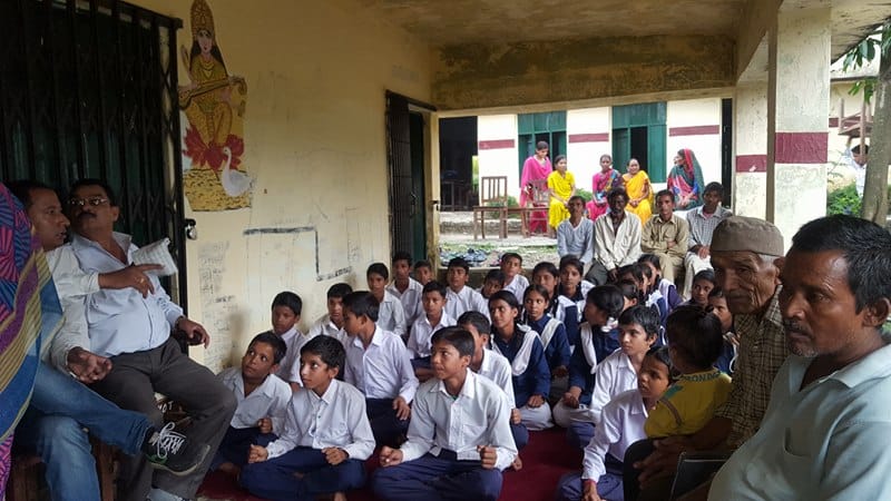 teacher make bridge on river for students