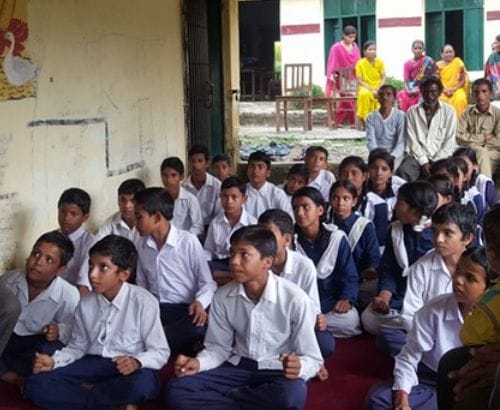 teacher make bridge on river for students