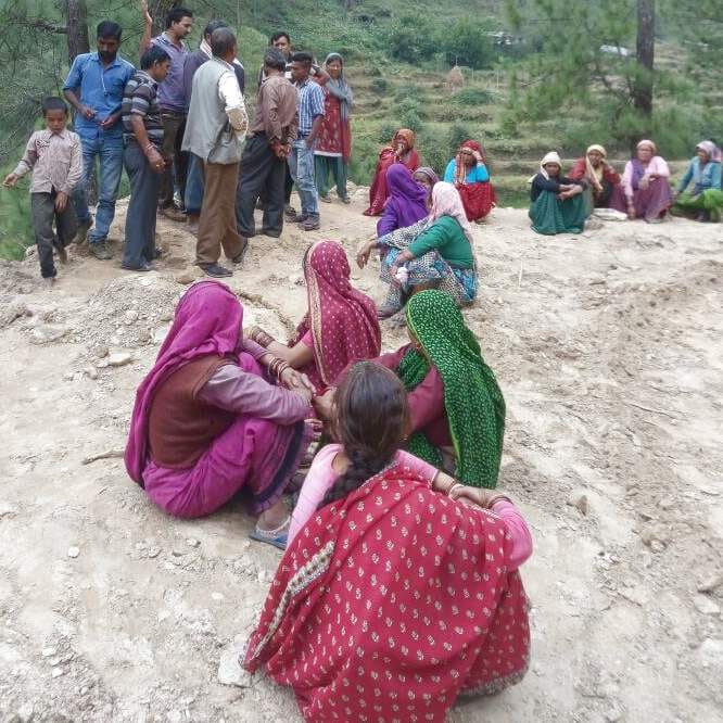 Villagers blocked roads.