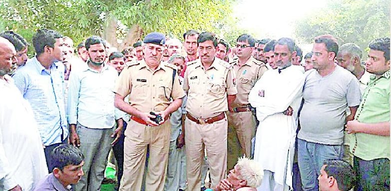 Angry businessman sitting on dharna