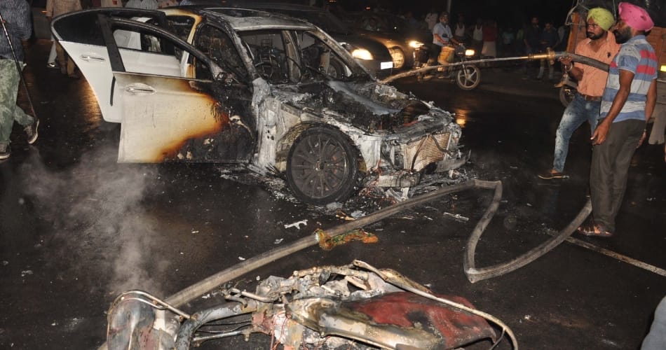 bmw car hit activa rider, after accident bmw catches fire, one death