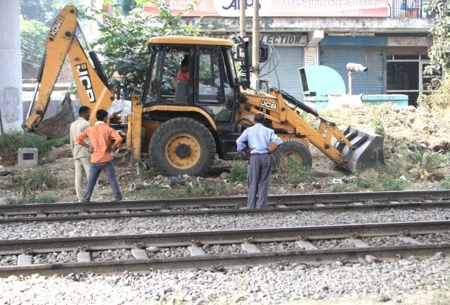 body was then removed from the bushes along the railway track