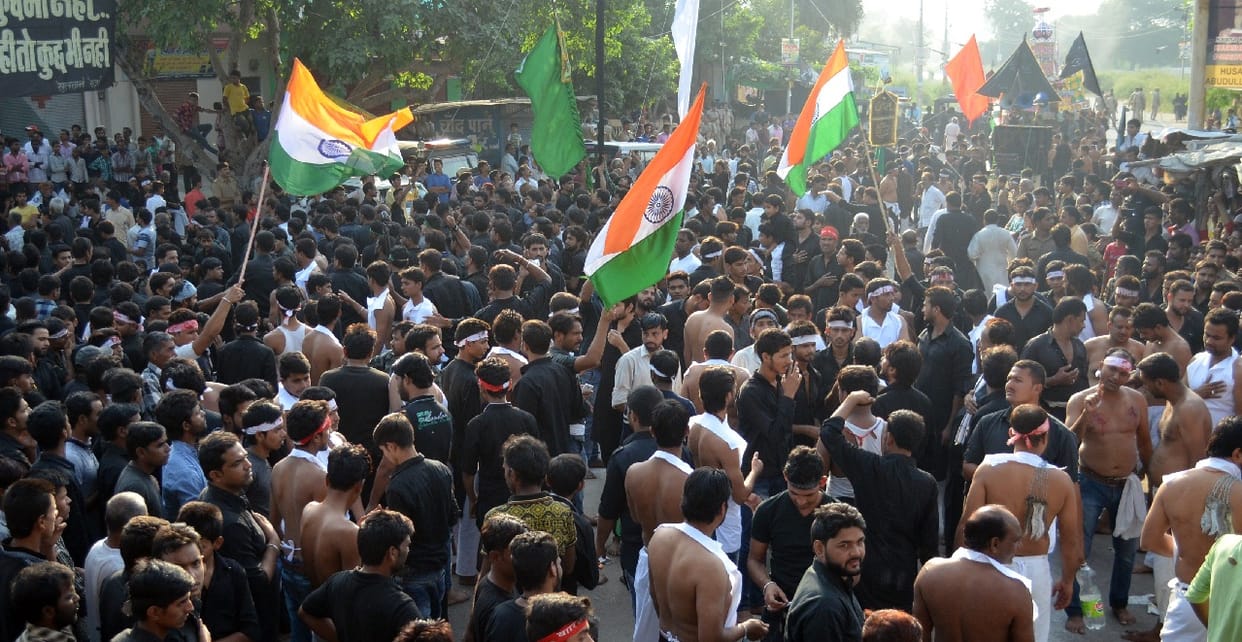 Ram and Mahatma Gandhi among weeds referring Tajiye buried in Karbala