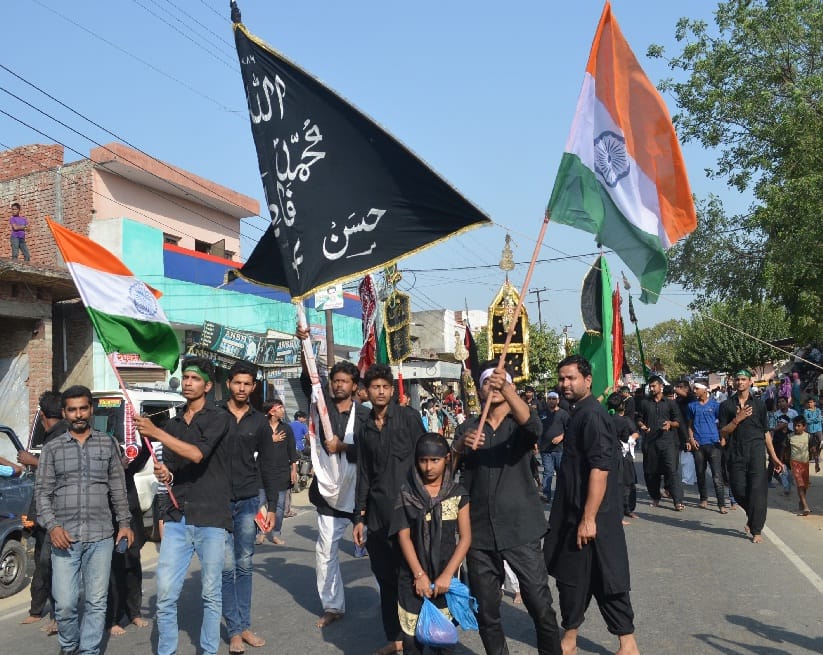 Ram and Mahatma Gandhi among weeds referring Tajiye buried in Karbala