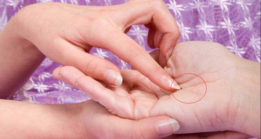 palmistry mole on hand meaning