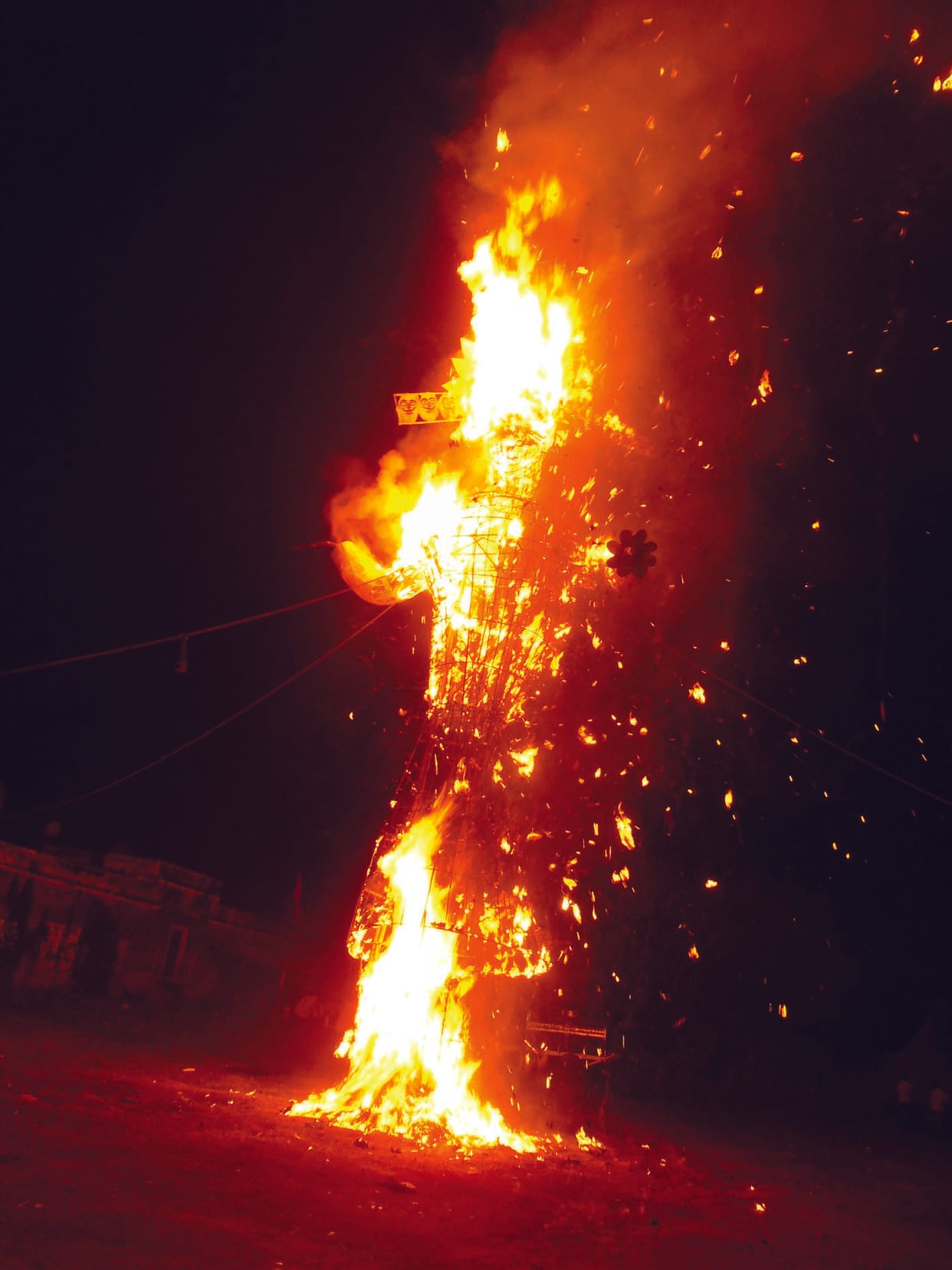 Flames burn Ravana.