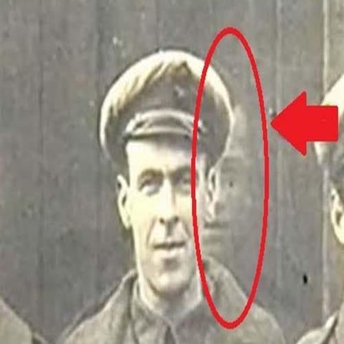 aircraft mechanic Freddy Jackson ghost in a group photo